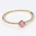 CZ Quatrefoil Stone Accented Twisted Hinged Bangle Bracelet - Pink